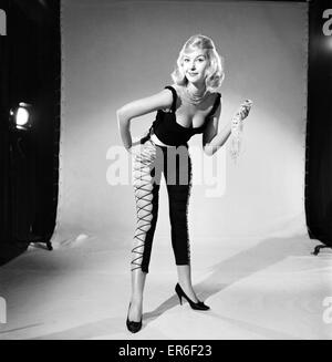 Clothing: Fashion: Tights. Model Peggy Moran seen here wearing laced tights. January 1961 E432-001 Stock Photo