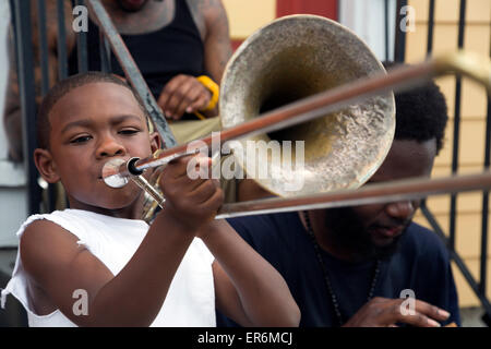 New Orleans, Louisiana - A boy plays a trombone. Stock Photo