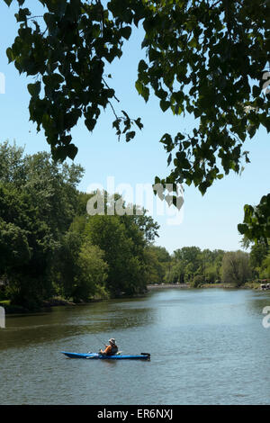 Man in kayak on Erie Canal Trail, Fairport NY USA. Stock Photo