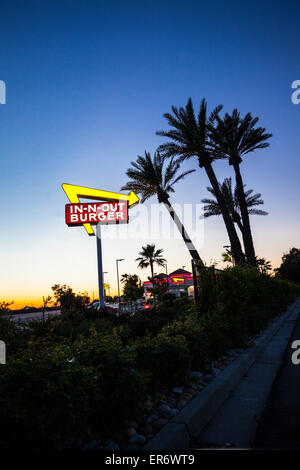 An In-N-Out Hamburger restaurant in Modesto California at dusk Stock Photo