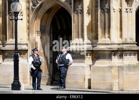 London, England, UK. Armed police on duty at the Houses of Parliament, Westminster