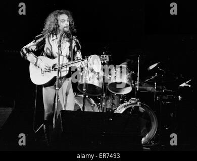 Jethro Tull in concert, 1975 - Ian Anderson playing acoustic guitar. Stock Photo