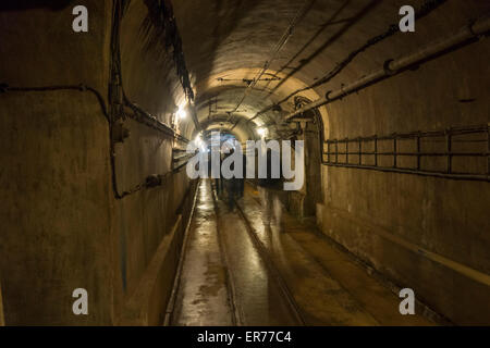 Fort de Fermont, Longuyon, France. people walking in an underground Maginot line fortress Stock Photo