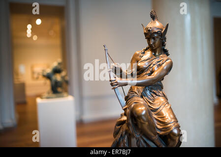 WASHINGTON DC, United States — A bronze sculpture titled Amazon Preparing for Battle (Queen Antiope or Hippolyta?) or Amred Venus (circa 1860-1882) by French sculptor Pierre-Eugene-Emile Hebert (1828-1893). Located on the eastern end of the National Mall, the National Gallery of Art features major collections of artworks from the Middle Ages to the present. It was privately established in 1937. The National Gallery of Art is renowned for its collection of European and American art, offering a comprehensive timeline of artistic development from the Middle Ages to the present day. Its esteemed s Stock Photo
