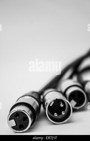 XLR cables and connections details. Poster background. Stock Photo