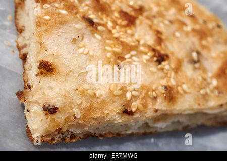 Chinese style grilled sesame pancake, Chinatown, Flushing, NYC, USA Stock Photo