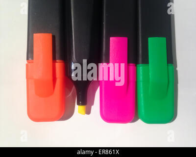 Variety of colour highlight pen. Yellow pen is uncapped. Stock Photo