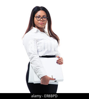 Afro american businesswoman standing with folders isolated on a white background. Looking at camera Stock Photo
