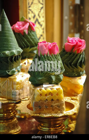 Thai candle decoration offering in temple Stock Photo