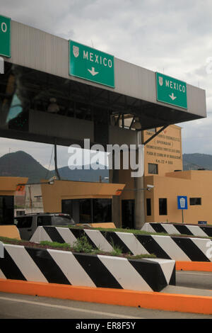 Toll booth on highway against sky Stock Photo