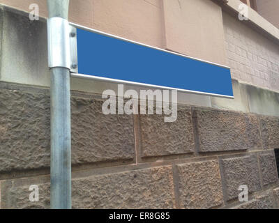 Blank direction blue sign on a metal pole Stock Photo