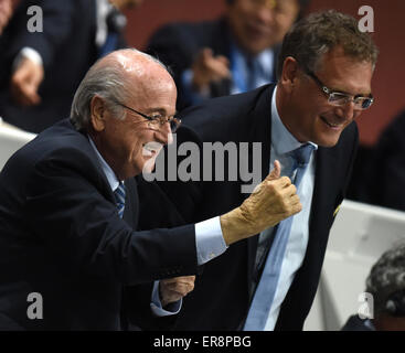 Zurich, Switzerland. 29th May, 2015. FIFA President Joseph S. Blatter (L) and FIFA Secretary General Jérôme Valcke (R) react during the 65th FIFA Congress with the president's election at the Hallenstadion in Zurich, Switzerland, 29 May 2015. Photo: Patrick Seeger/dpa/Alamy Live News Stock Photo