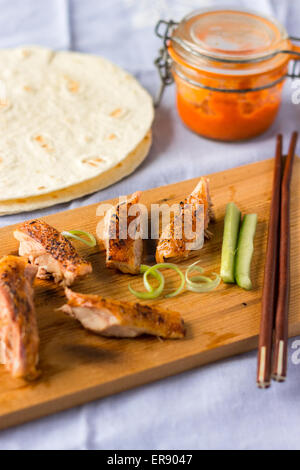 Roast duck with pancakes and chilli sauce Stock Photo