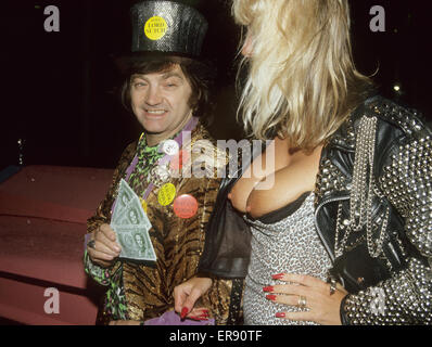 SCREAMING  LORD SUTCH  (1940-1999) UK pop musician and later would-be politician with model and actress Lindsey Drew about 1995 Stock Photo