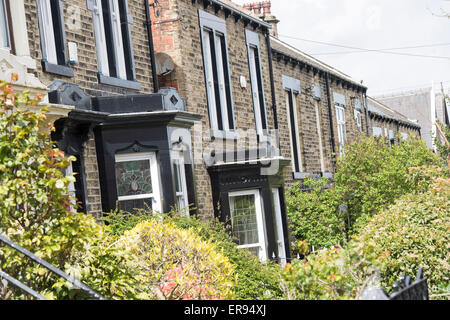 Terraced houses in a street in Barnsley Stock Photo