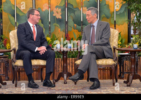 US Secretary of Defense Ashton Carter meets with the Prime Minister of Singapore Lee Hsien Loong May 29, 2015 in Singapore. Stock Photo