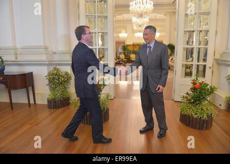 US Secretary of Defense Ashton Carter meets with the Prime Minister of Singapore Lee Hsien Loong May 29, 2015 in Singapore. Stock Photo