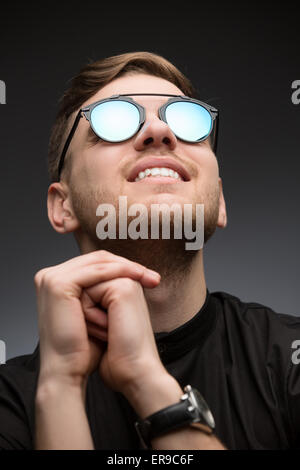 Portet young guy in mirrored sunglasses Stock Photo