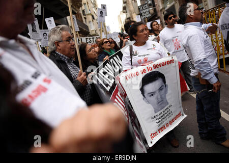 Montevideo, Uruguay. 29th May, 2015. People take part during the 'Caravan 43 South America', in support of companions and family members of the 43 missing Mexican students of the Normal Rural School 'Raul Isidro Burgos' of Ayotzinapa, in front of Mexico's embassy in Montevideo, capital of Uruguay, on May 29, 2015. Credit:  Nicolas Celaya/Xinhua/Alamy Live News Stock Photo