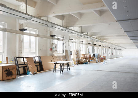 White, messy industrial interior before preparation during Milan design week on April 15, 2015 in Milan Stock Photo