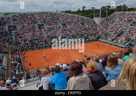 Paris France. 29th May, 2015. At Roland Garros French Open, Paris. Suzanne Lenglen Court. Two French players, Giles Simon in black defeating Mahut in white in a long match. Credit:  Paul Quayle/Alamy Live News Stock Photo