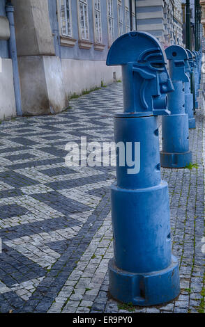 The light blue metal Cubist Bollards in Malostranske namesti (Little Quarter Square) in Prague Stock Photo