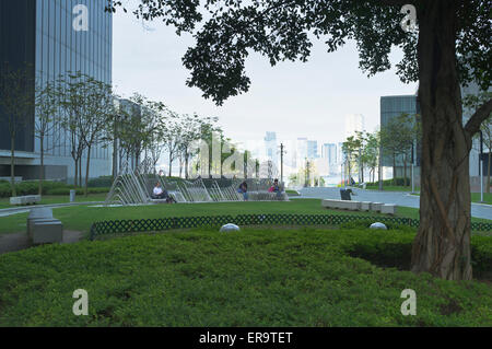 dh Tamar Park ADMIRALTY HONG KONG People relaxing in park city Stock Photo