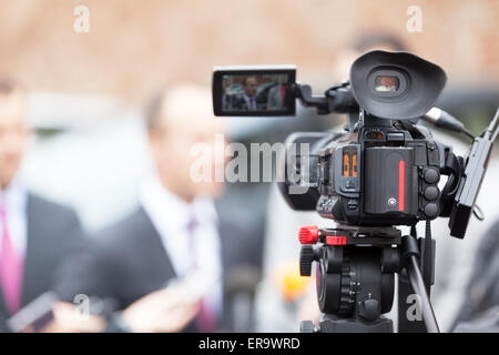 Filming an media event with a video camera Stock Photo