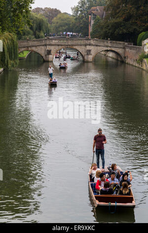 UK, England, Cambridge.  Punting on the River Cam, Clare Bridge in background. Stock Photo