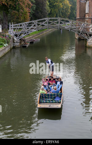 UK, England, Cambridge.  Punting on the River Cam by the Mathematical Bridge, Queen's College.