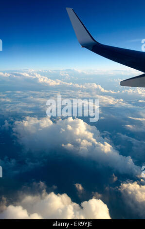 Aeroplane wing, clouds and sea, over Tasman Sea, between Australia and New Zealand Stock Photo