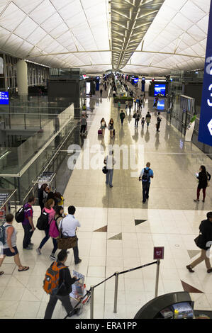 dh Hong Kong airport CHEK LAP KOK HONG KONG People departure gates walkway concourse Stock Photo