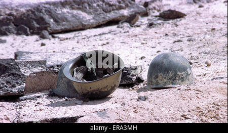 5th March 1991 Disgarded Iraqi soldiers’ helmets in the desert, next to Route 801, the road to Umm Qasr, north of Kuwait City.