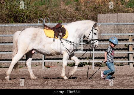 girl with pony Stock Photo