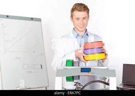 Scientist working with three-dimensional  printer Stock Photo