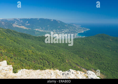 View on Yalta city from the Ai-Petri mountain in Crimea, Ukraine. Stock Photo