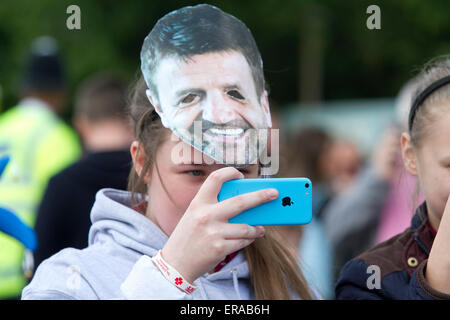 Wembley  London, UK. 30th May 2015. Aston Villa fan wearing a mask of manager Tim Sherwood. Fans in good spirits gather ahead of the 2015 FA Cup final showcase at Wembley Stadium between Aston Villa and Arsenal FC. Aston Villa are aiming to be win the FA Cup for the first time since 1957 Credit:  amer ghazzal/Alamy Live News Stock Photo