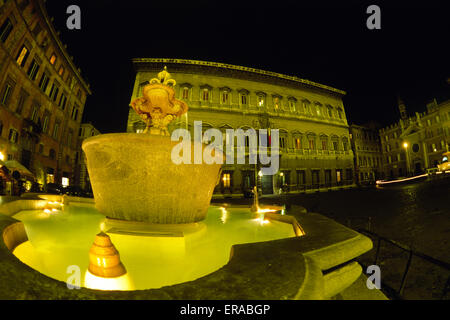 Italy, Rome, Piazza Farnese, fountain and Palazzo Farnese at night Stock Photo