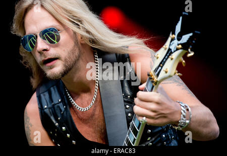 Munich, Germany. 30th May, 2015. Guitarist Richie Faulkner of the British rock band Judas Priest performs on stage during the Rockavaria Music Festival in Munich, Germany, 30 May 2015. Photo : Sven Hoppe/dpa/Alamy Live News Stock Photo