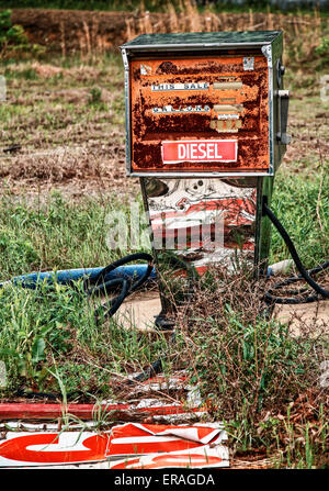 Gutted diesel pump at an abandoned gas station and restaurant. Stock Photo