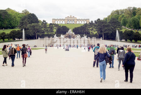 Vienna, Austria - May 1, 2015: Tourists are visiting the Neptune Fountain in the former imperial summer residence known as Schon Stock Photo