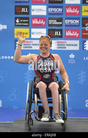London, UK. 30th May, 2015. Mary Catherine Callahan (USA) looking happy as she climbs onto the podium to get a gold medal for first place in the Women's PT1 Paratriathlon at the Vitality World Triathlon, London. Callahan's winning time was 01:28:19. Credit:  Michael Preston/Alamy Live News Stock Photo