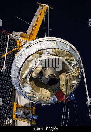 The Low-Density Supersonic Decelerator is lifted into position for a full mission dress rehearsal at the U.S. Navy Pacific Missile Range Facility May 29, 2015 in Kauai, Hawaii.  The LDSD tests new concepts in entry, descent and landing of spacecraft safely on the surface of Mars. Stock Photo