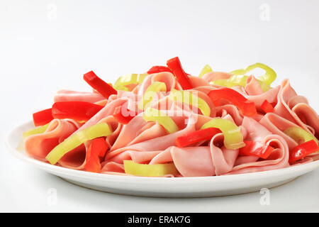Thinly sliced ham and strips of fresh pepper Stock Photo