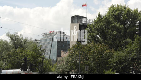 Sunny view across ulica Towarowa to observation tower, with 'PW' Kotwica symbol, Warsaw Uprising Museum, Warsaw, Poland Stock Photo