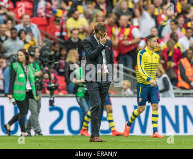 London, UK. 30th May, 2015. Aston Villa's manager Tim Sherwood is dejected at the end of the game during the FA Cup Final between Aston Villa and Arsenal at Wembley stadium in London, Britain, on May 30, 2015. Arsenal won the FA Cup after winning 4-0. Credit:  Richard Washbrooke/Xinhua/Alamy Live News Stock Photo