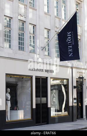 An unidentified man believed to be a friend of Alexander McQueen, outside  McQueen's flat in central London Stock Photo - Alamy