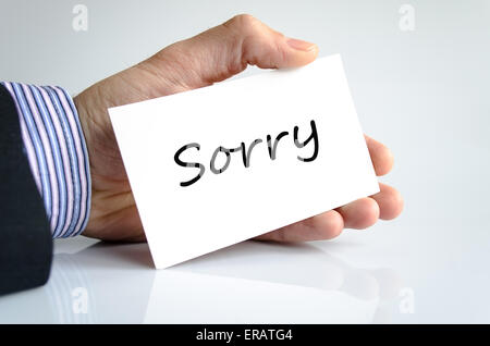 Sorry note in business man hand Stock Photo