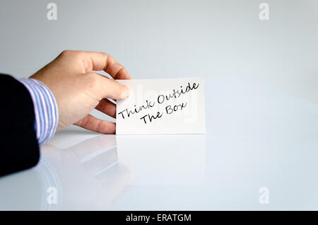 Business man hand writing Think outside the box Stock Photo