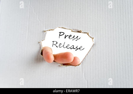 Hand and text on the cardboard background Press release Stock Photo